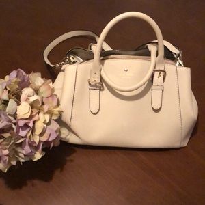 Kate Spade cream-colored handbag